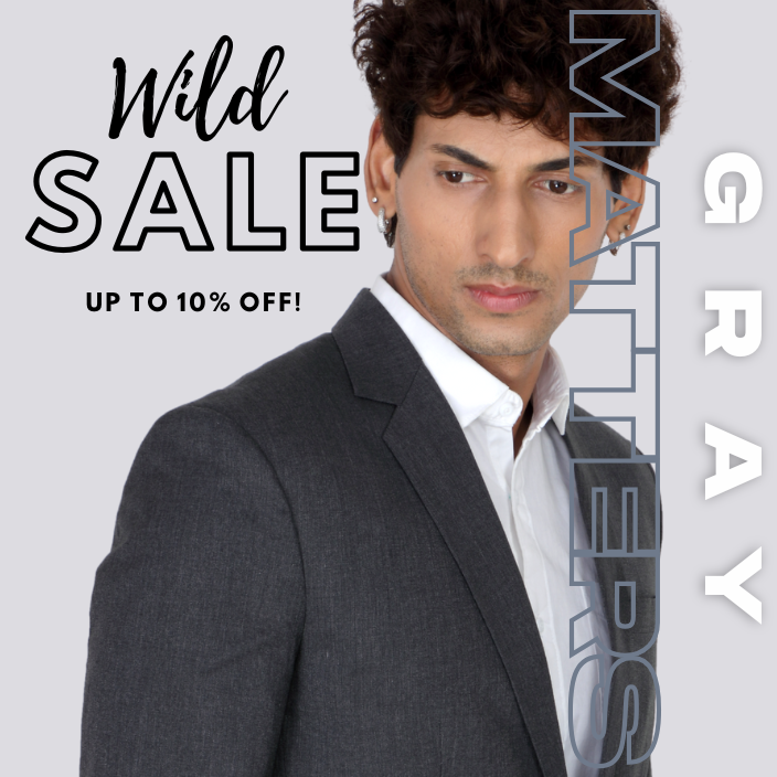 Men's navy blue slim-fit blazer on a model.