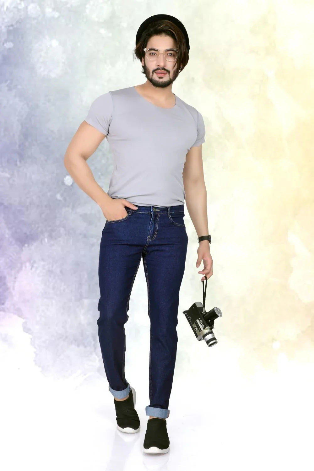 A close-up shot of a male model wearing LP Creation Men's Blue Denim Cargo Jeans, highlighting the fabric texture and pockets