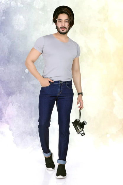 A close-up shot of a male model wearing LP Creation Men's Blue Denim Cargo Jeans, highlighting the fabric texture and pockets