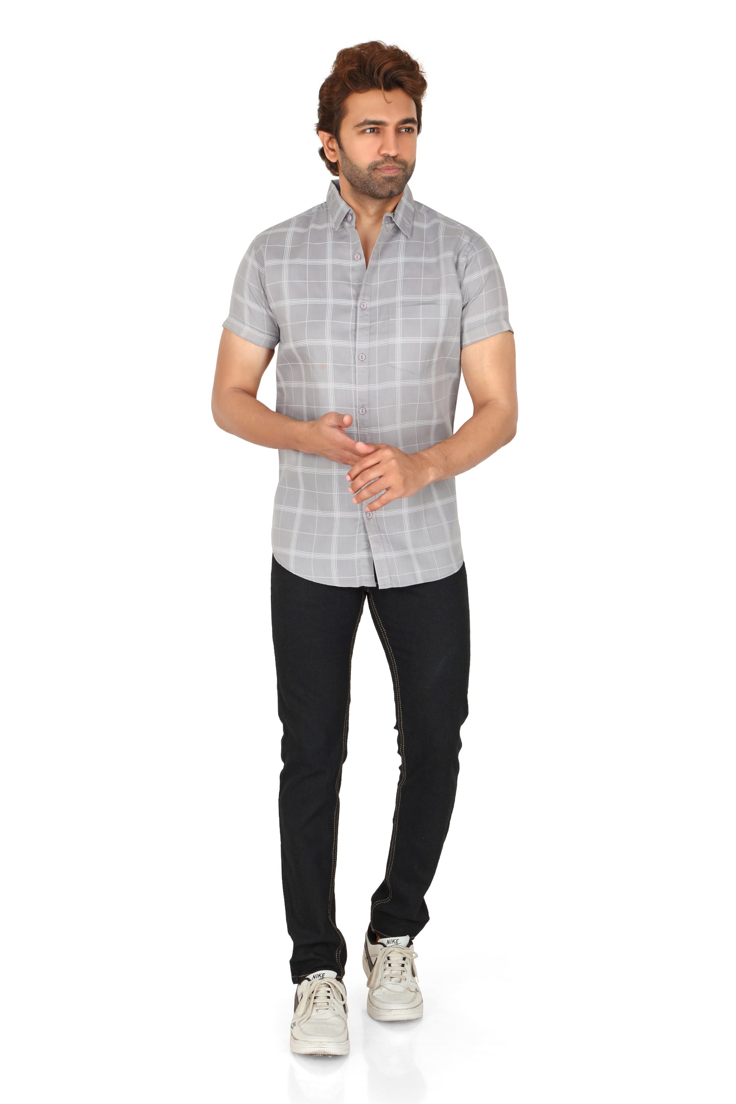 Men's casual half-sleeve checked shirt in a regular fit with a spread collar. The shirt is wrinkle-free and designed for comfort.