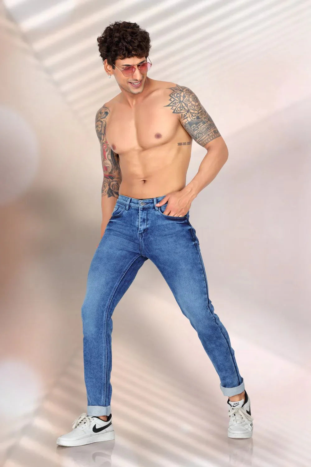 Stylish men's light wash jeans by LP Creation, featuring a comfortable straight fit and a classic 5-pocket design. 