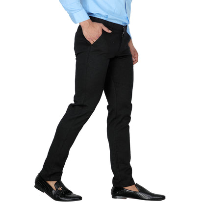 A man wearing Men's Straight Fit Black Cotton Pants for a casual day out