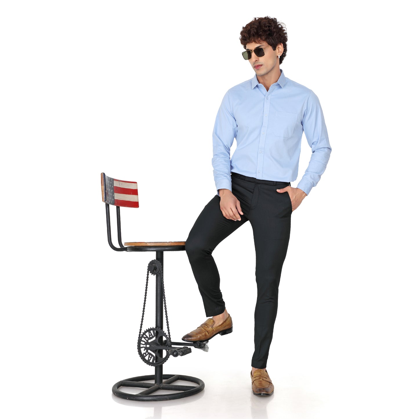 Men's Slim Fit Black Formal Trousers styled on a model in a studio setting. The image shows the plain cotton fabric and a slim silhouette.

