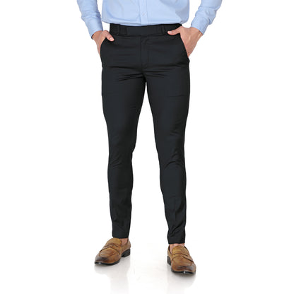 Close-up of the durable black cotton fabric and button closure of the men's formal trousers.